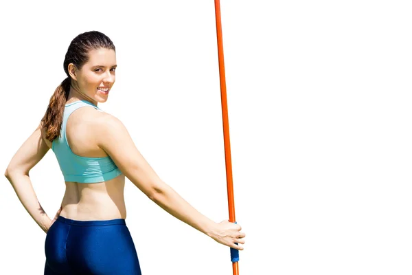 Sporty woman holding a javelin — Stock Photo, Image