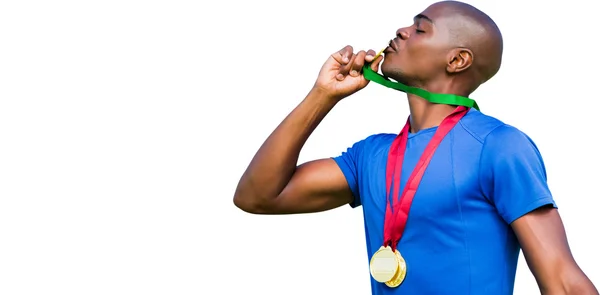 Vencedor beijando medalhas — Fotografia de Stock