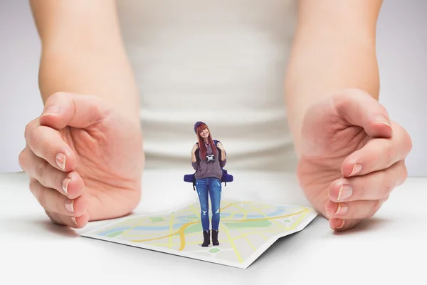 Woman holding binoculars — Stock Photo, Image