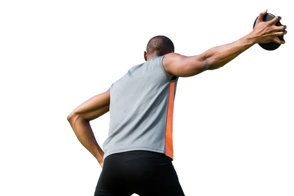 Sportsman is practicing discus throw — Stock Photo, Image