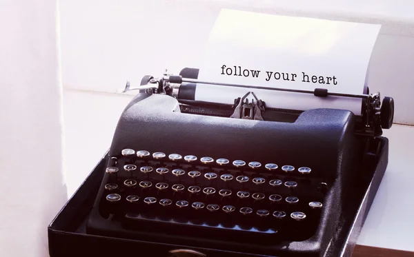 Follow your heart message on typewriter — Stock Photo, Image