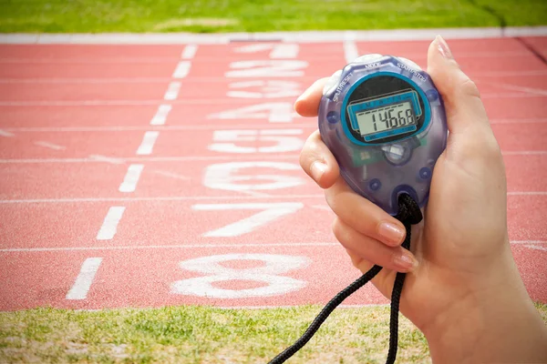 Hand met een timer — Stockfoto