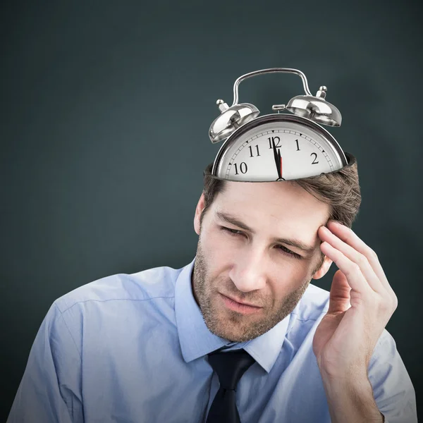 Stressed businessman holding head — Stock Photo, Image