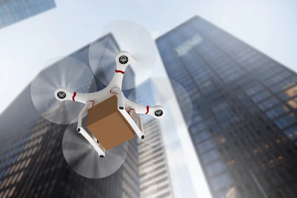 Drohne mit einem Karton — Stockfoto