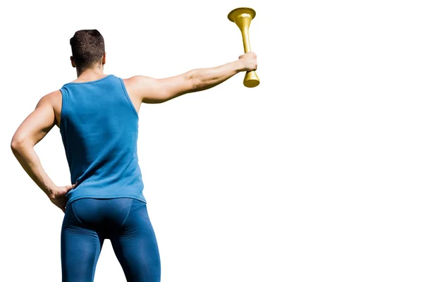 Athletic man holding Olympic torch — Stock Photo, Image