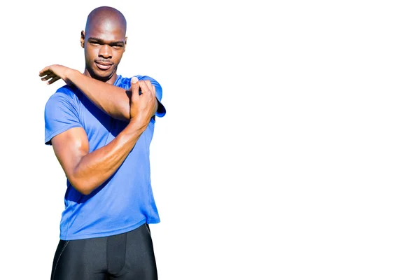 Uomo atletico che tende le braccia — Foto Stock