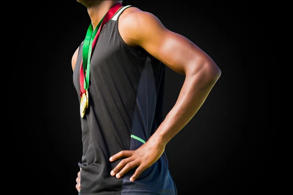 Sportovec hrudníku s medailemi — Stock fotografie