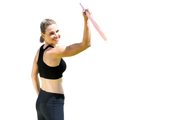 Mujer deportiva sosteniendo una jabalina — Foto de Stock