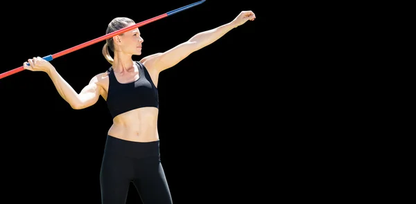 Sportovkyně praktikující hod oštěpem — Stock fotografie