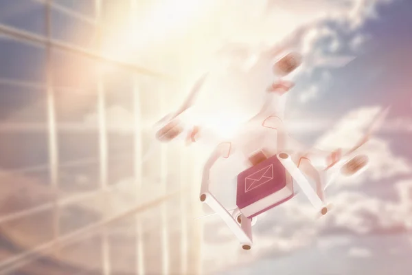 Drone holding a cube — Stock Photo, Image