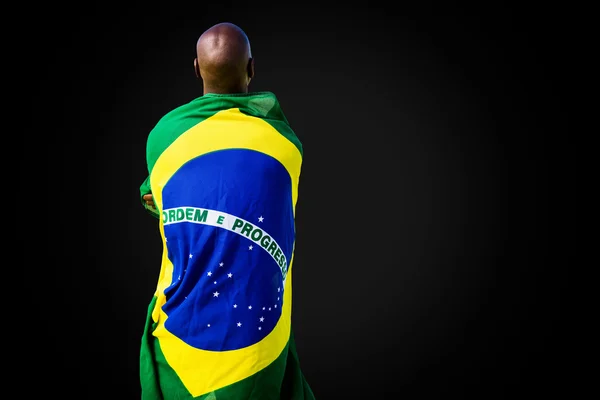 Braziliaanse sportman op zwart — Stockfoto