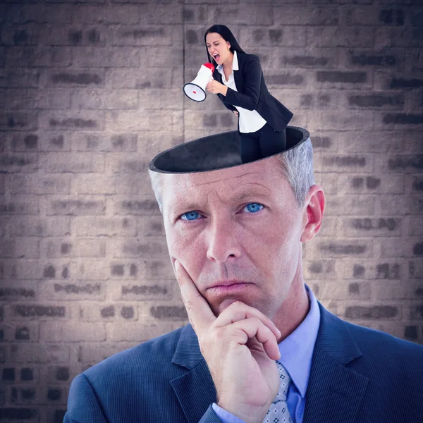 Businesswoman shouting with megaphone — Stock Photo, Image