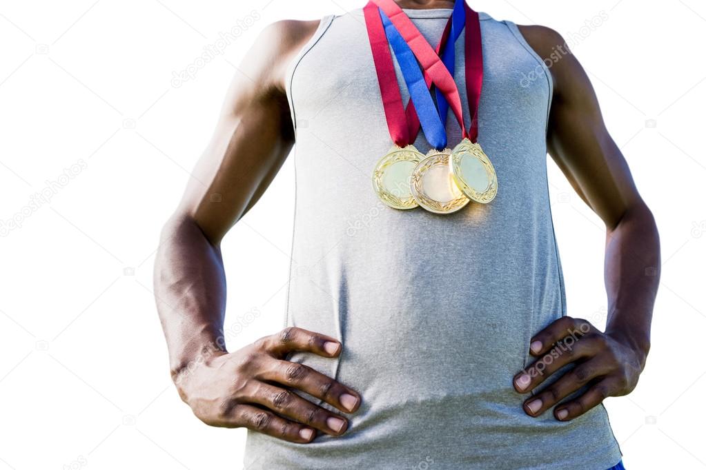 Poitrine de sportif avec médailles image libre de droit par Wavebreakmedia  © #110703032