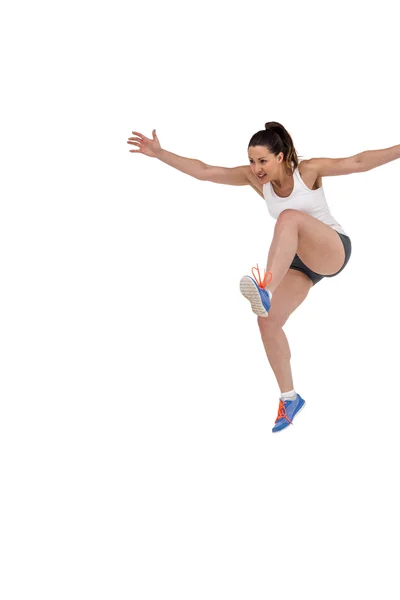 Idrottskvinna springande — Stockfoto
