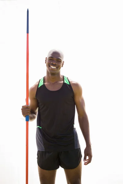 Atleta de pé com dardo — Fotografia de Stock