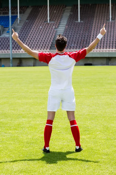 Jogador de futebol animado no estádio — Fotografia de Stock