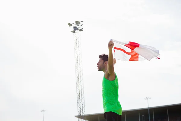 Atleet poseren met Engelse vlag — Stockfoto