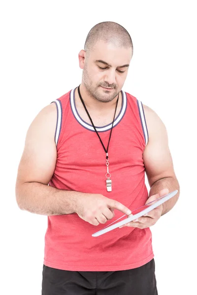 Athlete using digital tablet — Stock Photo, Image