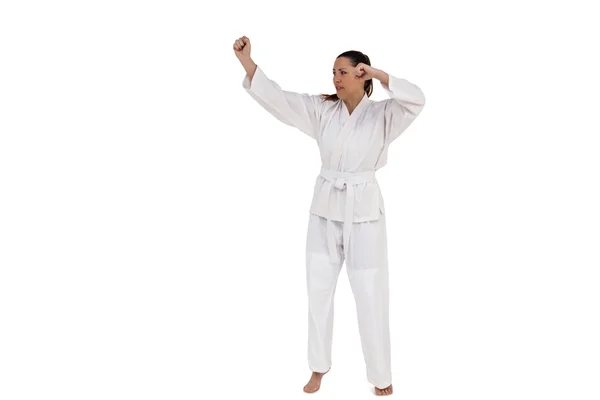 Fighter performing karate stance — Stock Photo, Image