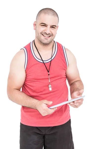 Athlete holding a digital tablet — Stock Photo, Image
