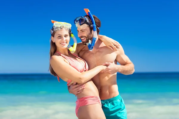 Couple embracing each other on beach — Stock Photo, Image