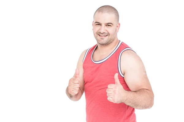 Athlete posing and giving a thumbs up — Stock Photo, Image