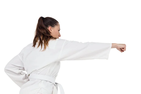 Female fighter performing karate stance — Stock Photo, Image