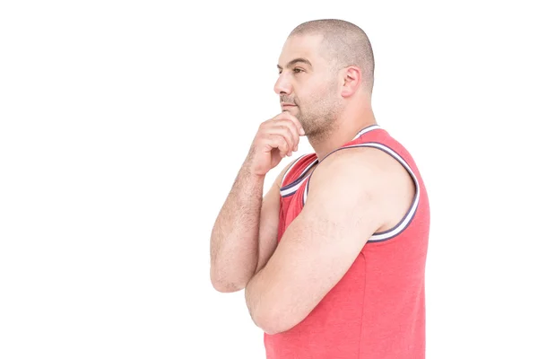 Athlete posing with hand on chin — Stock Photo, Image