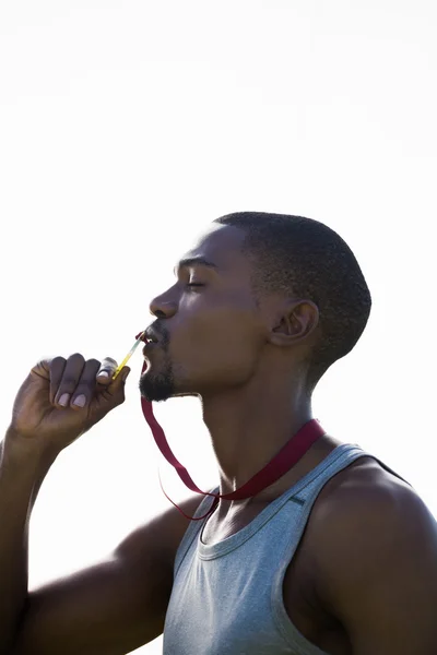 Athlete kissing his gold medal — Stock Photo, Image