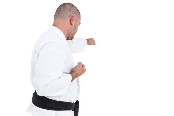 Fighter utför karate ställning — Stockfoto