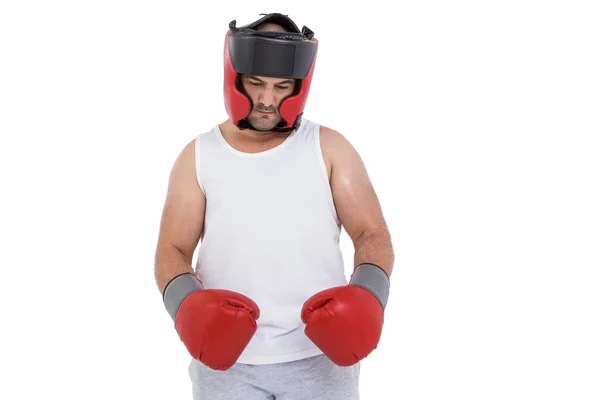 Boxer bär huvudet beskyddare och handskar — Stockfoto