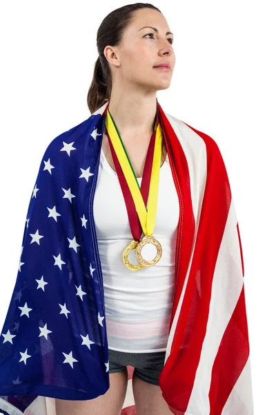 Atleta posando con bandera americana — Foto de Stock