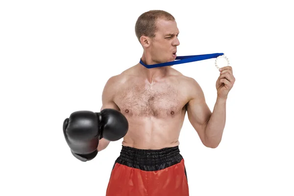 Unhappy boxer looking at silver medal — Stock Photo, Image