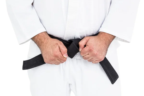 Luchador de karate haciendo puños — Foto de Stock