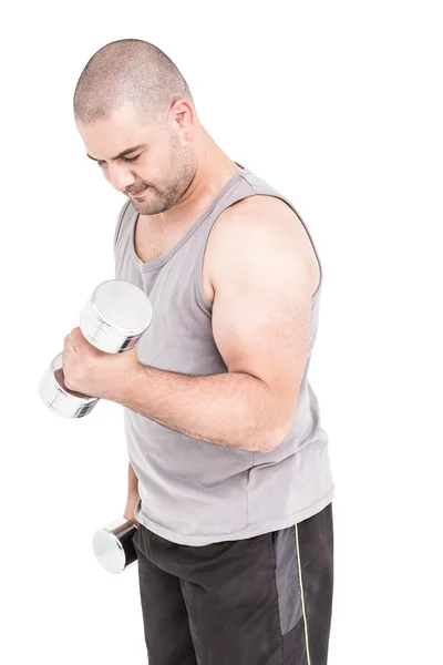 Athlete working out with dumbbells — Stock Photo, Image