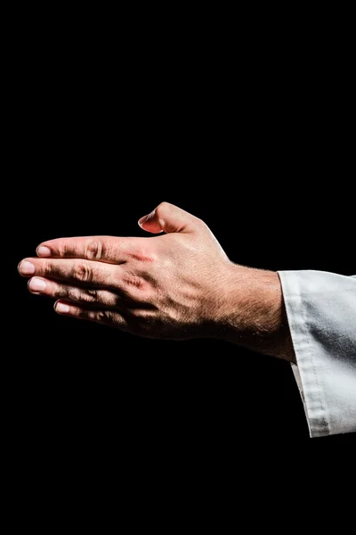 Karate player making hand gesture — Stock Photo, Image