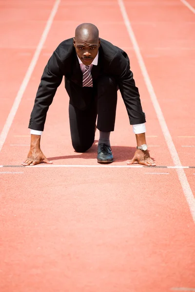 Empresário pronto para correr — Fotografia de Stock