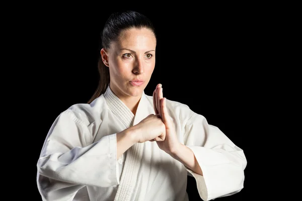 Mulher lutadora executando mão saudação — Fotografia de Stock