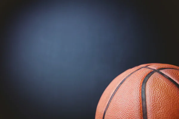 Close up of basketball on black — Stok Foto