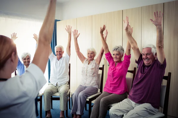 Seniors doing exercises — Stock Photo, Image