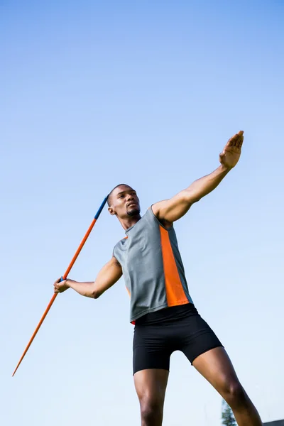 Athlete i ferd med å kaste et kastespyd – stockfoto