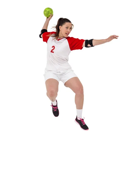 Sportswoman throwing a ball — Stock Photo, Image