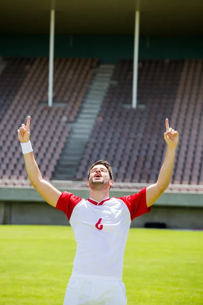 Emocionado jugador de fútbol —  Fotos de Stock