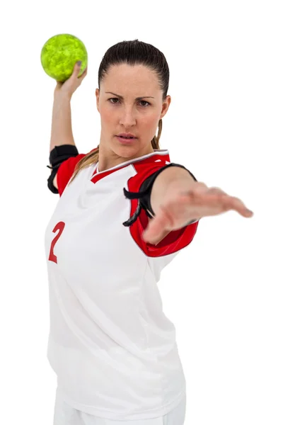 Sportswoman throwing a ball — Stock Photo, Image