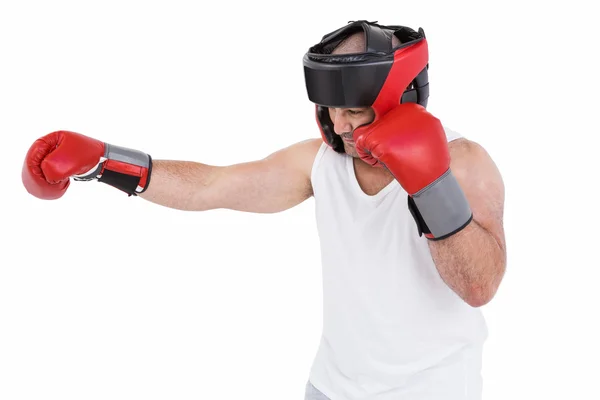 Boxer wearing head protector and gloves — Stock Photo, Image