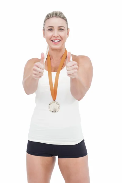 Atleta feminina vestindo medalha — Fotografia de Stock