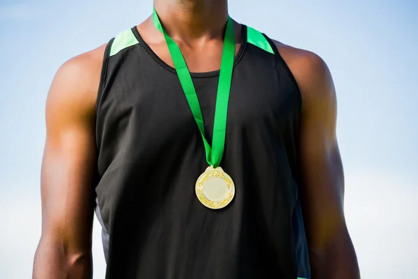Atleet met goud — Stockfoto