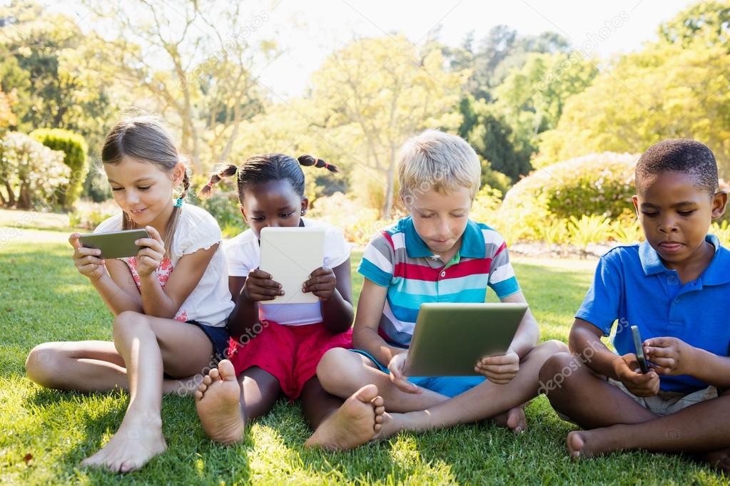 Kids using technology — Stock Photo © Wavebreakmedia #110811870