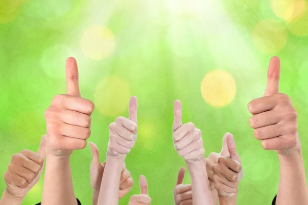 Composite image of thumbs up — Stock Photo, Image