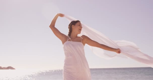 Woman smiling with a sheet — Stock Video